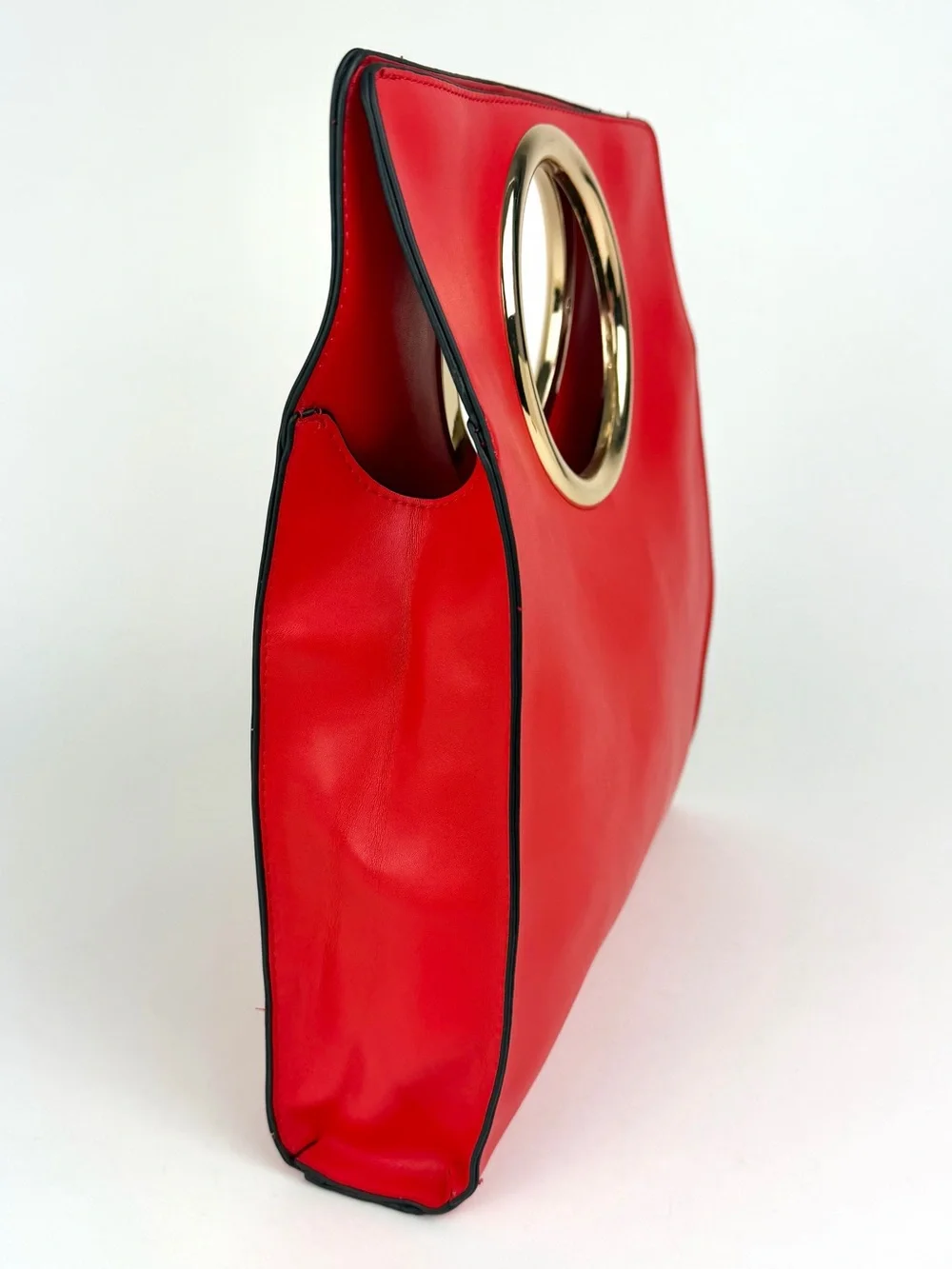 A New Day’s Foldover Metal Handle Clutch